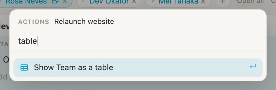 The Cmd-K menu on the relaunch, table typed, offering Show Team as a table