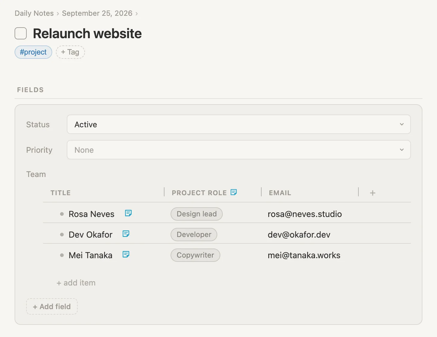The relaunch's Team field shown as a table: Rosa, Dev and Mei, with their project role and their email
